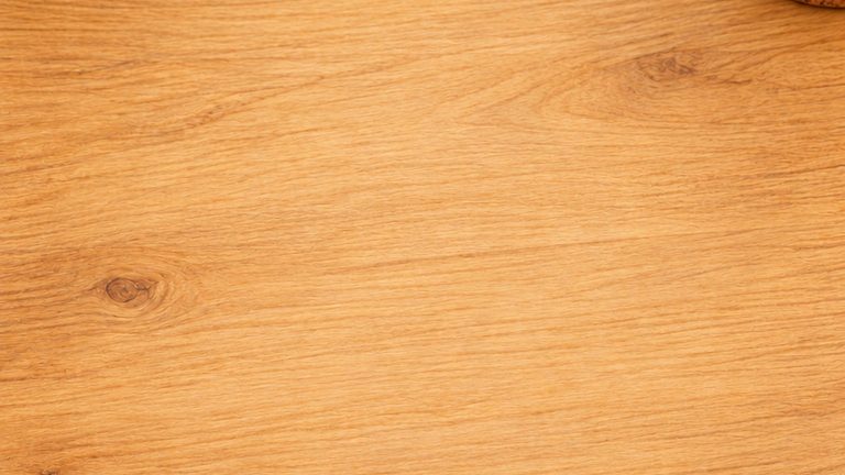 A warm wooden cafe table